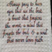 A towel with the words always pray to have eyes that see the best, a heart that forgives the worst, and a mind that forgets