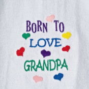 A white towel with the words " born to love grandpa ".