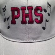 A close up of the letters and musical notes on a hat