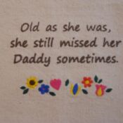 A towel with the words " old as she was, she still missed her daddy sometimes ".