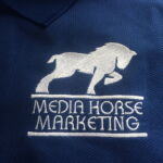 A close up of the logo on a polo shirt