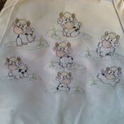 A white sheet with seven bears drawn on it.