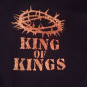 A black shirt with the words king of kings and crown