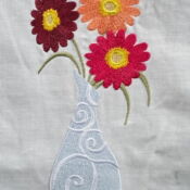 A vase with flowers in it on a table