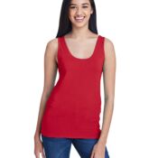 A woman wearing red tank top and jeans.