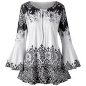 A black and white floral print top with bell sleeves.