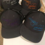 A group of hats that are sitting on top of a table.