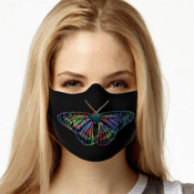 Blonde woman wearing black mask with colorful butterfly
