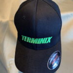 Black Terminix baseball cap with green logo