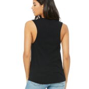 A woman wearing black tank top with flowers on it.