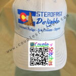 White cap with Colorado logo and QR sticker