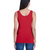 A woman wearing a red tank top with flowers on it.