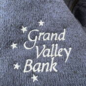 Grand Valley Bank embroidered logo on sweater