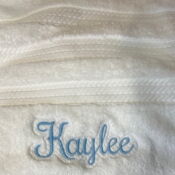 White towel embroidered with name Kaylee