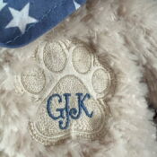 Plush teddy paw patch with blue monogram