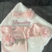 Pink embroidered baby blanket and outfit