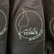 Face to Face Ministries logo on black shirts
