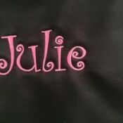 Pink "Julie" script on black Mary Kay bag