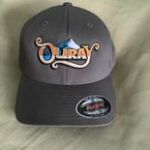 Gray embroidered cap with colorful Ouray logo
