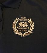 Gold laurel 100th anniversary embroidery on black polo