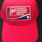 Red cap with veterans employee resource patch