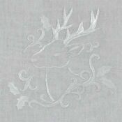 A white deer with leaves on it's head.