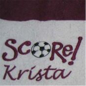 Towel embroidered "Score! Krista" with soccer ball