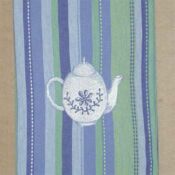 White embroidered teapot on blue-green striped fabric
