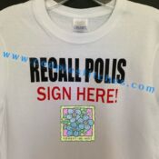 A white t-shirt with the words " recall polis sign here !" written on it.