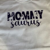 White tee with purple "Mommy Saurus" text