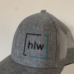 Gray mesh trucker hat with hlw logo