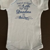 Light blue onesie reading "Grandma in Heaven