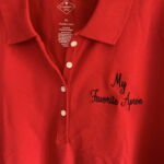 Red collared shirt embroidered My Favorite Apron