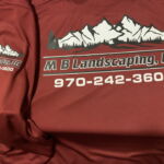 Maroon shirts with M B Landscaping logo