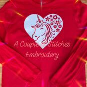 Red shirt with embroidered unicorn heart and sparkles
